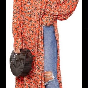 Free people c’est moi orange leopard tunic